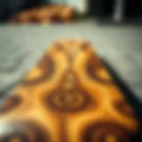 Artisan craftsmanship of the Arbor Oso skateboard deck showcasing intricate designs